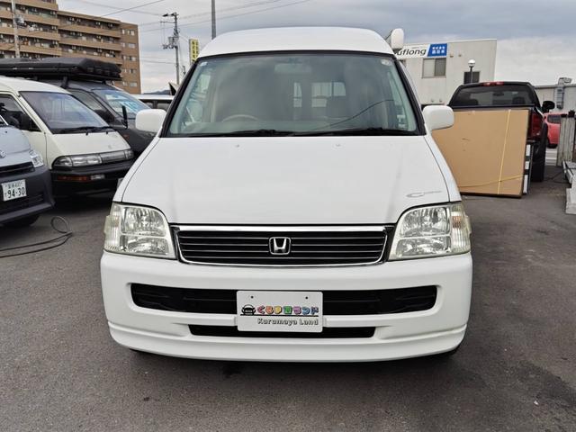 ステップワゴン キャンピングカー ウォークスルー フルフラット テレビ テーブル バックカメラ 3列シート ETC 4WD キーレスエントリー(6枚目)