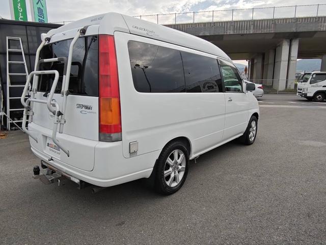 ステップワゴン キャンピングカー ウォークスルー フルフラット テレビ テーブル バックカメラ 3列シート ETC 4WD キーレスエントリー(9枚目)
