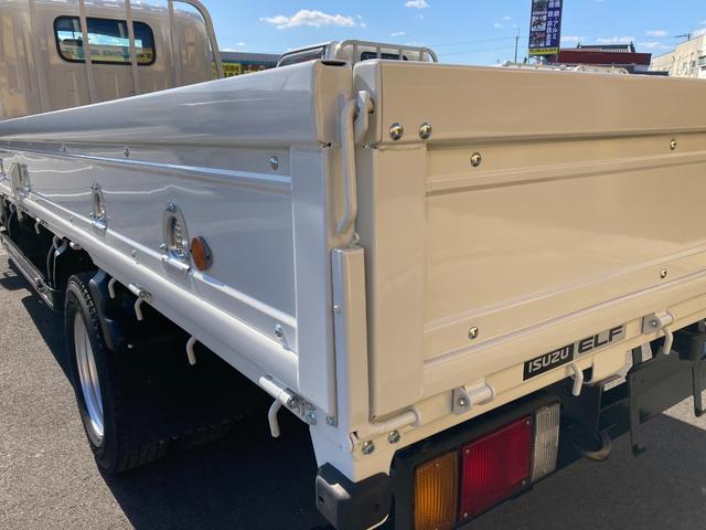 エルフトラック 2t ロング 低床 荷台鉄板張り 5速マニュアル セイコーラック ロープ穴4対 坂道発進補助 ETC(30枚目)