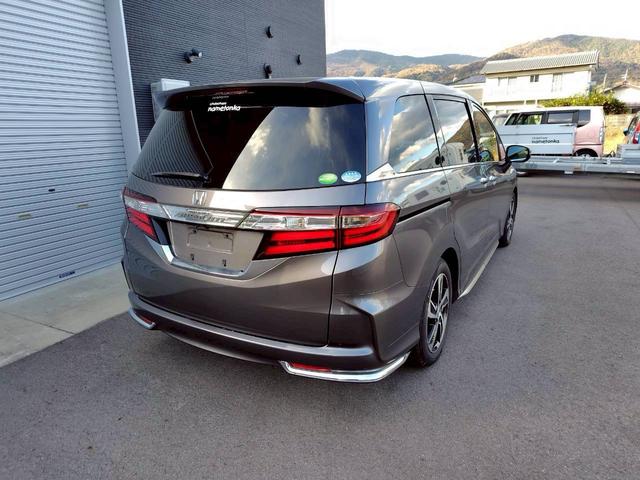 オデッセイ アブソルート　エンジンプッシュスタート／スマートキー／衝突軽減ブレーキ／地デジ／ナビ／バックカメラ／両側パワースライドドア／フリップダウンモニター／タイミングチェーン／ＨＩＤ／ＥＴＣ（5枚目）