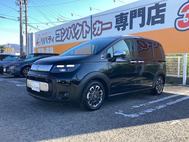 フリード e:HEVクロスター ブラインドスポットモニター オートクルーズコントロール レーンアシスト 衝突被害軽減システム 両側電動スライドドア オートライト LEDヘッドランプ スマートキー 電動格納ミラー シートヒーター(6枚目)