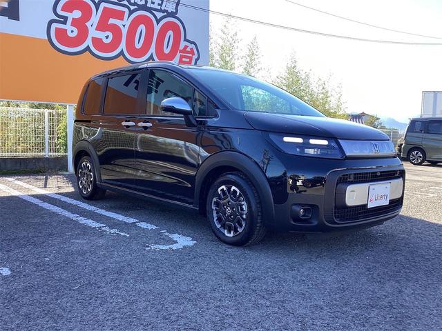 フリード e:HEVクロスター ブラインドスポットモニター オートクルーズコントロール レーンアシスト 衝突被害軽減システム 両側電動スライドドア オートライト LEDヘッドランプ スマートキー 電動格納ミラー シートヒーター(10枚目)