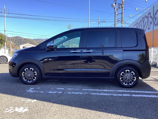 フリード e:HEVクロスター ブラインドスポットモニター オートクルーズコントロール レーンアシスト 衝突被害軽減システム 両側電動スライドドア オートライト LEDヘッドランプ スマートキー 電動格納ミラー シートヒーター(12枚目)