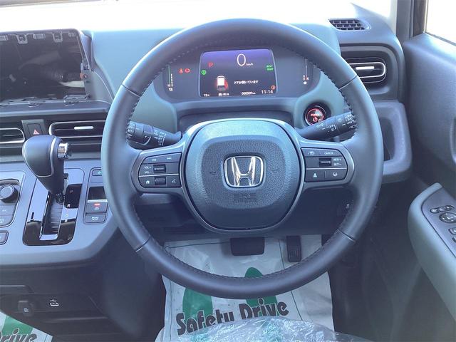 フリード e:HEVクロスター ブラインドスポットモニター オートクルーズコントロール レーンアシスト 衝突被害軽減システム 両側電動スライドドア オートライト LEDヘッドランプ スマートキー 電動格納ミラー シートヒーター(22枚目)