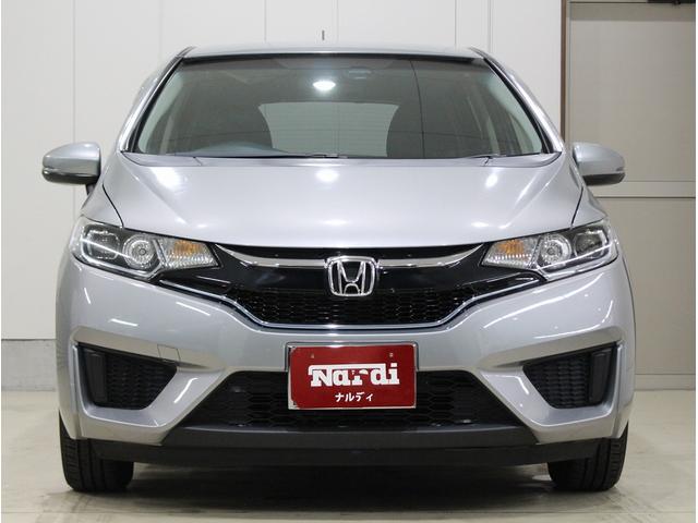 フィットハイブリッド Ｌパッケージ　純正ＨＤＤナビ・バックカメラ・ＥＴＣ・クルーズコントロール・ハーフレザーシート・本革巻きステアリング・ステアリングリモコン・ＬＥＤライト・ＡＵＴＯライト・衝突軽減システム・電動格納ミラー（2枚目）