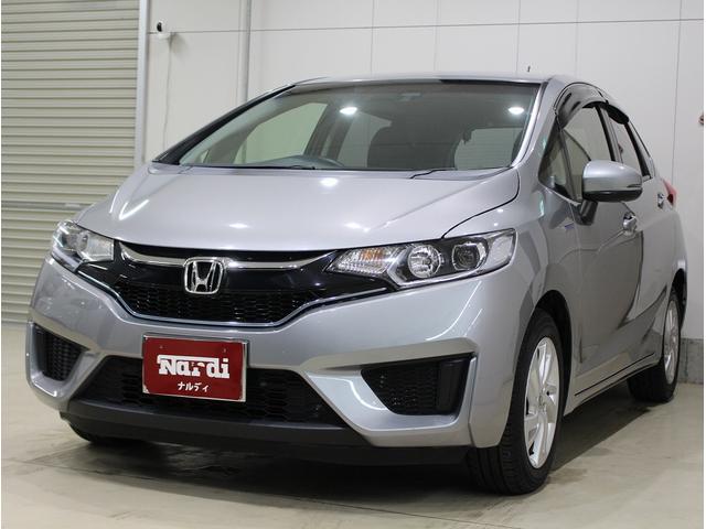 フィットハイブリッド Ｌパッケージ　純正ＨＤＤナビ・バックカメラ・ＥＴＣ・クルーズコントロール・ハーフレザーシート・本革巻きステアリング・ステアリングリモコン・ＬＥＤライト・ＡＵＴＯライト・衝突軽減システム・電動格納ミラー（3枚目）