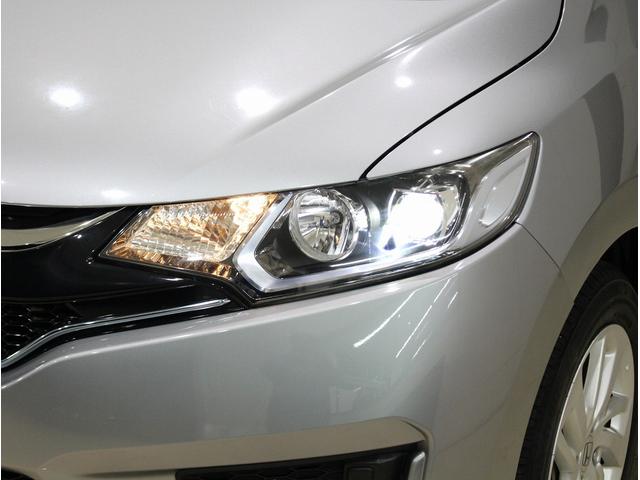 フィットハイブリッド Ｌパッケージ　純正ＨＤＤナビ・バックカメラ・ＥＴＣ・クルーズコントロール・ハーフレザーシート・本革巻きステアリング・ステアリングリモコン・ＬＥＤライト・ＡＵＴＯライト・衝突軽減システム・電動格納ミラー（6枚目）