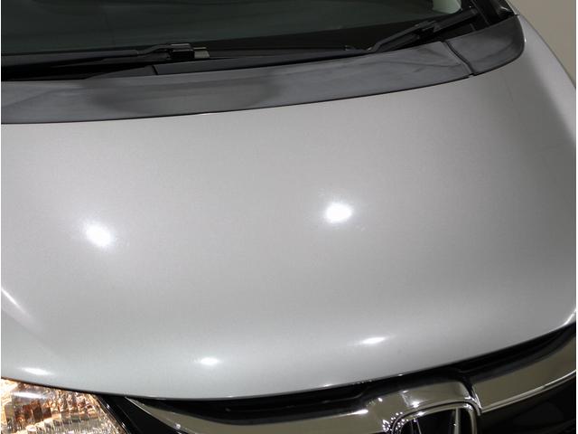 フィットハイブリッド Ｌパッケージ　純正ＨＤＤナビ・バックカメラ・ＥＴＣ・クルーズコントロール・ハーフレザーシート・本革巻きステアリング・ステアリングリモコン・ＬＥＤライト・ＡＵＴＯライト・衝突軽減システム・電動格納ミラー（8枚目）