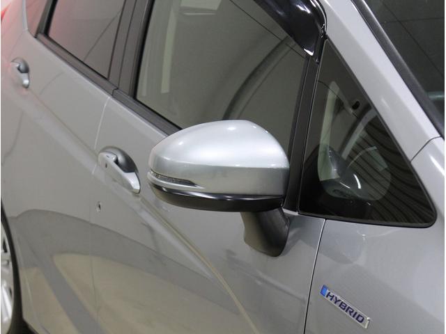 フィットハイブリッド Ｌパッケージ　純正ＨＤＤナビ・バックカメラ・ＥＴＣ・クルーズコントロール・ハーフレザーシート・本革巻きステアリング・ステアリングリモコン・ＬＥＤライト・ＡＵＴＯライト・衝突軽減システム・電動格納ミラー（10枚目）