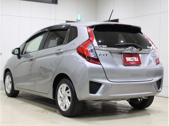 フィットハイブリッド Ｌパッケージ　純正ＨＤＤナビ・バックカメラ・ＥＴＣ・クルーズコントロール・ハーフレザーシート・本革巻きステアリング・ステアリングリモコン・ＬＥＤライト・ＡＵＴＯライト・衝突軽減システム・電動格納ミラー（14枚目）