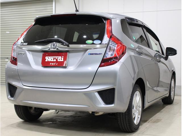 フィットハイブリッド Ｌパッケージ　純正ＨＤＤナビ・バックカメラ・ＥＴＣ・クルーズコントロール・ハーフレザーシート・本革巻きステアリング・ステアリングリモコン・ＬＥＤライト・ＡＵＴＯライト・衝突軽減システム・電動格納ミラー（16枚目）