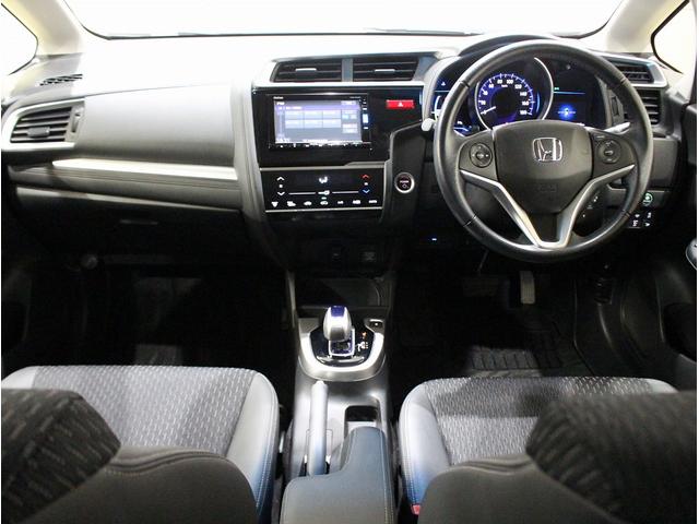 フィットハイブリッド Ｌパッケージ　純正ＨＤＤナビ・バックカメラ・ＥＴＣ・クルーズコントロール・ハーフレザーシート・本革巻きステアリング・ステアリングリモコン・ＬＥＤライト・ＡＵＴＯライト・衝突軽減システム・電動格納ミラー（20枚目）