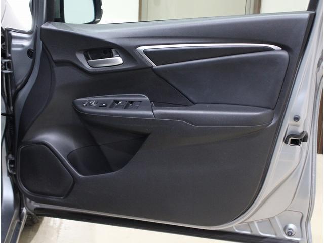 フィットハイブリッド Ｌパッケージ　純正ＨＤＤナビ・バックカメラ・ＥＴＣ・クルーズコントロール・ハーフレザーシート・本革巻きステアリング・ステアリングリモコン・ＬＥＤライト・ＡＵＴＯライト・衝突軽減システム・電動格納ミラー（22枚目）