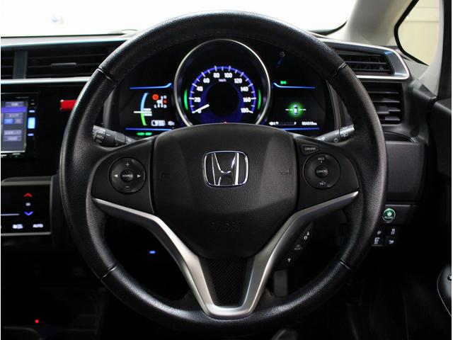 フィットハイブリッド Ｌパッケージ　純正ＨＤＤナビ・バックカメラ・ＥＴＣ・クルーズコントロール・ハーフレザーシート・本革巻きステアリング・ステアリングリモコン・ＬＥＤライト・ＡＵＴＯライト・衝突軽減システム・電動格納ミラー（29枚目）