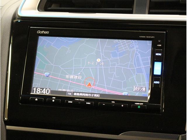 フィットハイブリッド Ｌパッケージ　純正ＨＤＤナビ・バックカメラ・ＥＴＣ・クルーズコントロール・ハーフレザーシート・本革巻きステアリング・ステアリングリモコン・ＬＥＤライト・ＡＵＴＯライト・衝突軽減システム・電動格納ミラー（33枚目）