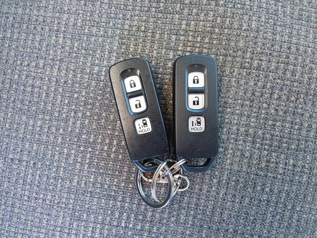 N-BOX G・Lホンダセンシング 左パワースライドドア 衝突軽減ブレーキ (ブリリアントスポーティブルー・メタリック) バックカメラ メモリーナビ テレビ アダプティブクルーズコントロール ETC(30枚目)