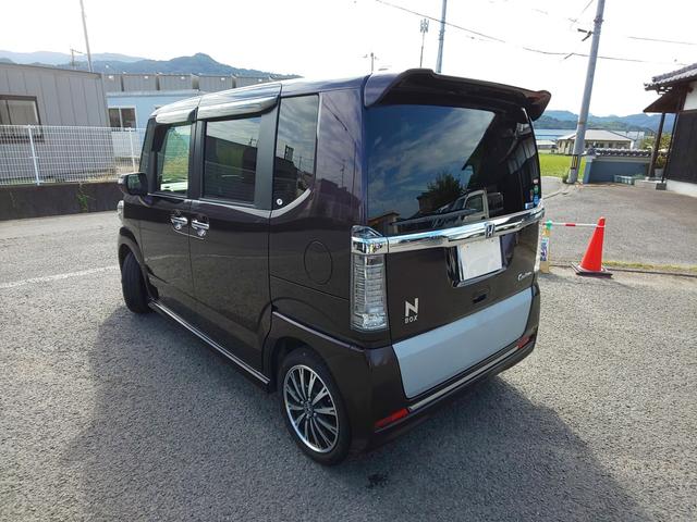 Ｎ－ＢＯＸカスタム Ｇ・ターボＬパッケージ　後期型　両側パワスラ　衝突軽減ブレーキ　（プレミアムベルベットパープルＰ）　ドライブレコーダー　バックカメラ　メモリーナビ　ワンセグテレビ　頸部衝撃緩和ヘッドレスト　アイドリングストップ（4枚目）