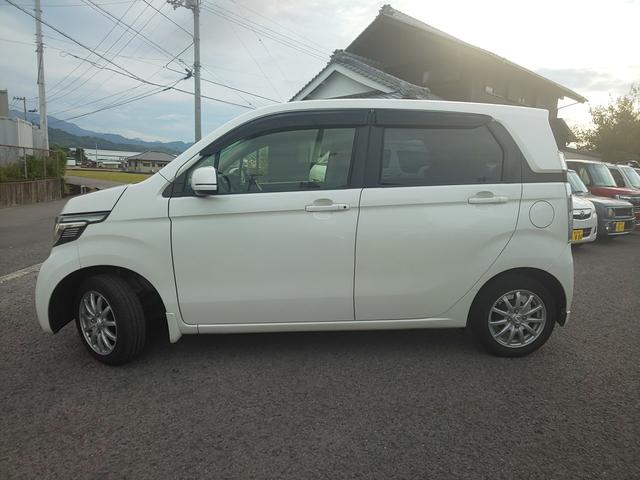 Ｎ－ＷＧＮ Ｇ・スタイリッシュパッケージ　衝突軽減ブレーキ　ＨＩＤヘッドライト　（プレミアムホワイト・パールＩＩ）　スマートキー　メモリーナビ　バックカメラ　アイドリングストップ　頸部衝撃緩和ヘッドレスト（4枚目）