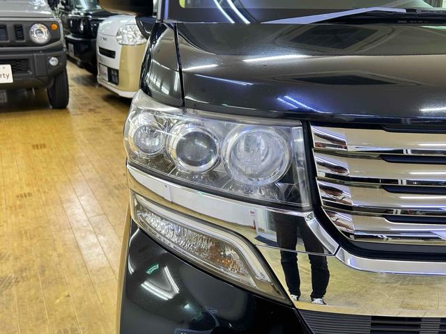 Ｎ－ＢＯＸカスタム Ｇ・Ｌパッケージ　ＥＴＣ　バックカメラ　両側スライド・片側電動　ＴＶ　オートライト　ＨＩＤ　スマートキー　アイドリングストップ　電動格納ミラー　ベンチシート　ＣＶＴ　盗難防止システム　ＡＢＳ　ＥＳＣ　ＣＤ　ＤＶＤ再生（24枚目）