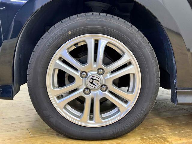 Ｎ－ＢＯＸカスタム Ｇ・Ｌパッケージ　ＥＴＣ　バックカメラ　両側スライド・片側電動　ＴＶ　オートライト　ＨＩＤ　スマートキー　アイドリングストップ　電動格納ミラー　ベンチシート　ＣＶＴ　盗難防止システム　ＡＢＳ　ＥＳＣ　ＣＤ　ＤＶＤ再生（34枚目）