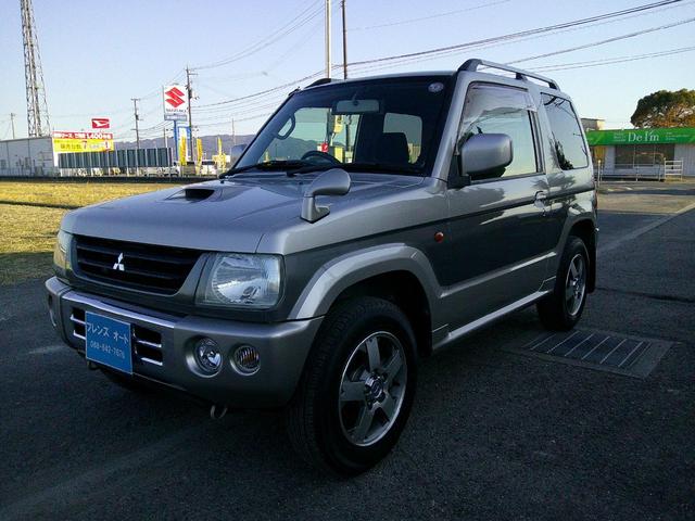 パジェロミニ アニバーサリーリミテッド タイミングベルト交換済み ナビ テレビ CD DVD SD ミュージックホルダー ブルートゥース ハンズフリー ETC アルミ 電格ミラー 取説保証書 フォグランプ キーレス(5枚目)