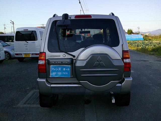 パジェロミニ アニバーサリーリミテッド タイミングベルト交換済み ナビ テレビ CD DVD SD ミュージックホルダー ブルートゥース ハンズフリー ETC アルミ 電格ミラー 取説保証書 フォグランプ キーレス(8枚目)