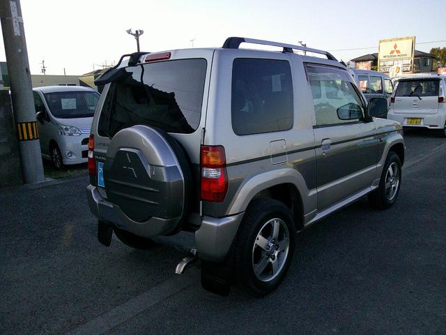 パジェロミニ アニバーサリーリミテッド タイミングベルト交換済み ナビ テレビ CD DVD SD ミュージックホルダー ブルートゥース ハンズフリー ETC アルミ 電格ミラー 取説保証書 フォグランプ キーレス(9枚目)