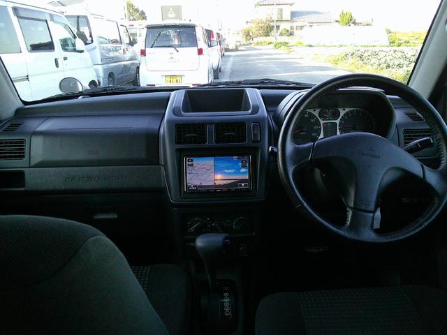 パジェロミニ アニバーサリーリミテッド タイミングベルト交換済み ナビ テレビ CD DVD SD ミュージックホルダー ブルートゥース ハンズフリー ETC アルミ 電格ミラー 取説保証書 フォグランプ キーレス(11枚目)