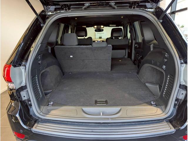 ジープ・グランドチェロキー ラレード 禁煙車/パワーシート/バックカメラ/純正18インチアルミ/純正ナビ/フルセグTV/カープレイ/革巻きステアリング/ルーフレール/HIDヘッドライト/クリアランスソナー/フォグランプ/ETC/(72枚目)