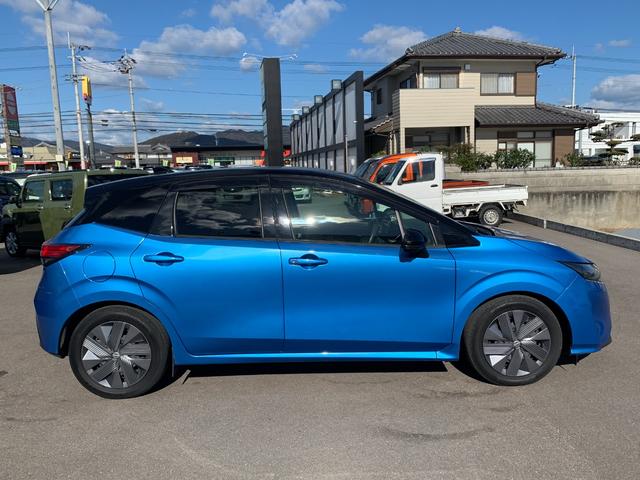 ノート Ｘ　純正９インチナビ（ＢＴ／ＦＭ／ＡＭ／ＴＶ）バックカメラ　アラウンドビューモニター　ＥＴＣ　バックカメラ　ワイアレス充電　コーナーセンサー　デジタルインナーミラー　ＳＯＳコール　オートライト（9枚目）