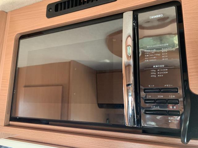 カムロード 　社外ナビ　Ｂｌｕｅｔｏｏｔｈ　バックカメラ　１００Ｖコンセント　マニュアルエアコン　テレビ　シガーソケット　ベット　１００Ｖエアコン　ソーラーパネル　電子レンジ　ソファー　冷蔵庫　換気扇　ＥＴＣ（57枚目）