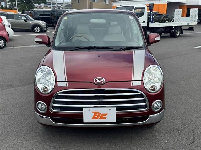 ミラジーノ プレミアムＬ　車検整備付　社外ＳＤナビ　地デジ　ＤＶＤ再生　ＥＴＣ　ＭＯＭＯ製ウッドコンビハンドル　電格ミラー　キーレス　レザー調シートカバー　ＬＥＤヘッド　フォグライト　Ｐガラス　社外１４ＡＷ　マットバイザー（9枚目）