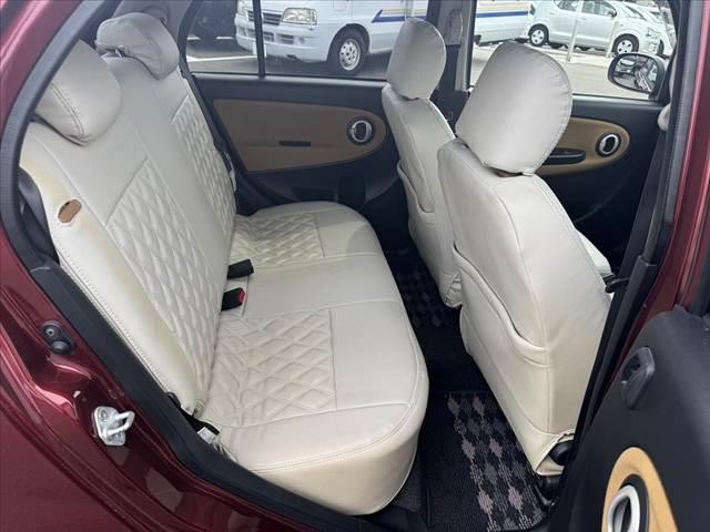 ミラジーノ プレミアムＬ　車検整備付　社外ＳＤナビ　地デジ　ＤＶＤ再生　ＥＴＣ　ＭＯＭＯ製ウッドコンビハンドル　電格ミラー　キーレス　レザー調シートカバー　ＬＥＤヘッド　フォグライト　Ｐガラス　社外１４ＡＷ　マットバイザー（18枚目）