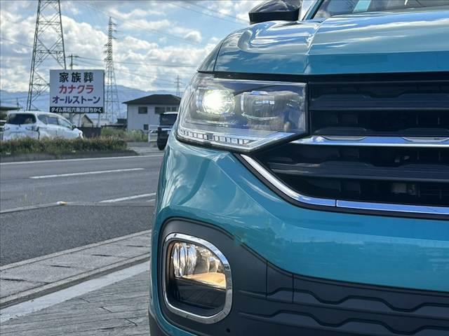 Ｔ－クロス ＴＳＩ　１ｓｔプラス　オールインセーフティ　Ａクルコン　Ａハイビーム　ＢＳＭ　純正ナビ　ＢＴ　Ｂカメラ　ステリモ　コーナーセンサー　オートＬＥＤ　スマートキー　純正１８ＡＷ　チルトステア　シートリフター　ルーフレール（32枚目）