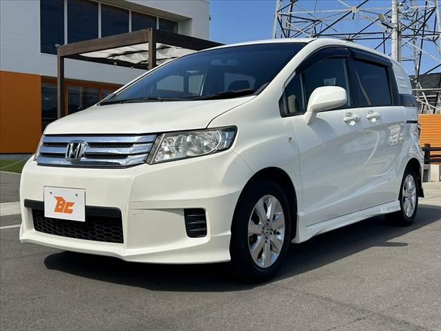 フリードスパイク G エアロ 禁煙車 車検整備付 電動スライドドア ナビ フルセグ バックモニター スマートキー2ケ DVD再生 ETC HIDオートライト マット バイザー ビルトインテーブル プライバシーガラス バニティミラー(10枚目)