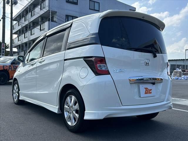 フリードスパイク G エアロ 禁煙車 車検整備付 電動スライドドア ナビ フルセグ バックモニター スマートキー2ケ DVD再生 ETC HIDオートライト マット バイザー ビルトインテーブル プライバシーガラス バニティミラー(13枚目)