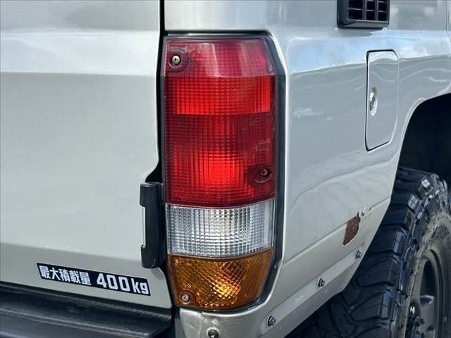 ランドクルーザー７０ ＬＸ　４ＷＤ　リフトアップ　社外ハンドル　社外ＳＤナビ　フルセグ　Ｂｌｕｅｔｏｏｔｈ　ＥＴＣ　スペアキー　Ｒガラスフィルム施工　ルーフキャリア　フロアマット　ドアバイザー（36枚目）