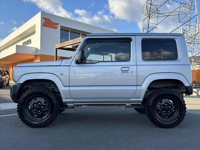 ジムニー XG 禁煙車 5MT 4WD 社外SDナビ フルセグ BT DVD キーレス スペアキー 横滑り防止 チルトステア ヨコハマ製マッドタイヤ サイドカーテンエアB マット プライバシーガラス レベライザー(11枚目)