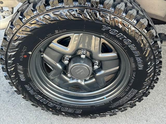 ジムニー XG 禁煙車 5MT 4WD 社外SDナビ フルセグ BT DVD キーレス スペアキー 横滑り防止 チルトステア ヨコハマ製マッドタイヤ サイドカーテンエアB マット プライバシーガラス レベライザー(35枚目)