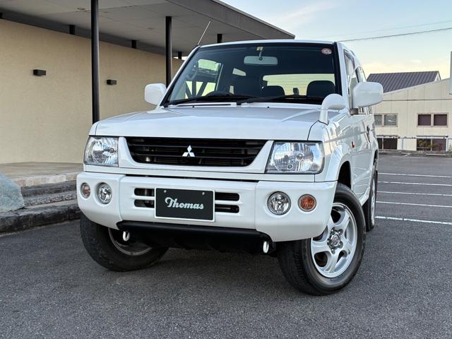 パジェロミニ Ｘ　５ＭＴ　４ＷＤ　禁煙車　ワンオーナー　純正オーディオ　純正アルミホイール　ＥＴＣ　電動格納式ドアミラー　キーレス　衝突安全ボディ　運転席助手席エアバック　エアコン　パワステ　ドアバイザー　フロアマット（8枚目）