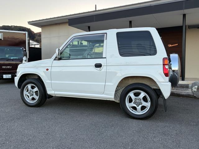 パジェロミニ Ｘ　５ＭＴ　４ＷＤ　禁煙車　ワンオーナー　純正オーディオ　純正アルミホイール　ＥＴＣ　電動格納式ドアミラー　キーレス　衝突安全ボディ　運転席助手席エアバック　エアコン　パワステ　ドアバイザー　フロアマット（11枚目）