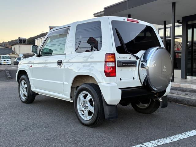 パジェロミニ Ｘ　５ＭＴ　４ＷＤ　禁煙車　ワンオーナー　純正オーディオ　純正アルミホイール　ＥＴＣ　電動格納式ドアミラー　キーレス　衝突安全ボディ　運転席助手席エアバック　エアコン　パワステ　ドアバイザー　フロアマット（12枚目）