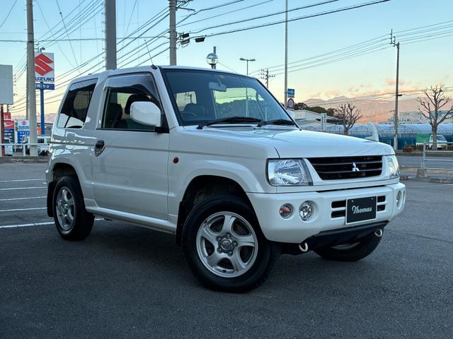 パジェロミニ Ｘ　５ＭＴ　４ＷＤ　禁煙車　ワンオーナー　純正オーディオ　純正アルミホイール　ＥＴＣ　電動格納式ドアミラー　キーレス　衝突安全ボディ　運転席助手席エアバック　エアコン　パワステ　ドアバイザー　フロアマット（18枚目）