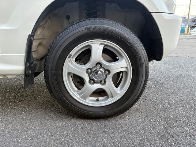 パジェロミニ Ｘ　５ＭＴ　４ＷＤ　禁煙車　ワンオーナー　純正オーディオ　純正アルミホイール　ＥＴＣ　電動格納式ドアミラー　キーレス　衝突安全ボディ　運転席助手席エアバック　エアコン　パワステ　ドアバイザー　フロアマット（20枚目）