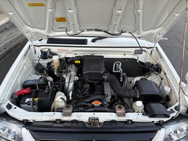 パジェロミニ Ｘ　５ＭＴ　４ＷＤ　禁煙車　ワンオーナー　純正オーディオ　純正アルミホイール　ＥＴＣ　電動格納式ドアミラー　キーレス　衝突安全ボディ　運転席助手席エアバック　エアコン　パワステ　ドアバイザー　フロアマット（24枚目）