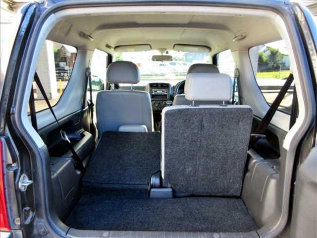 ランドベンチャー ユーザー買取車/4WD/ターボ/純正CDオーディオ/キーレスキー/ETC/純正16インチAW/運転席シートヒーター/電格ウインカーミラー/フォグランプ/ルーフレール/背面タイヤ(16枚目)