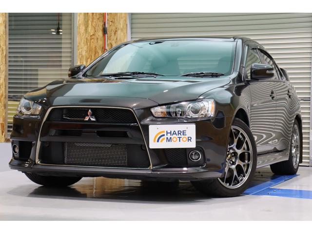 ランサー エボリューション ファイナルエディション BBS18インチAW・ビルシュタインショック・bremboレッドキャリパー・カロッツェリア メモリーナビ/フルセグTV・バックカメラ・ハーフレザーシート・レカロシート・保証書・取扱説明書(3枚目)