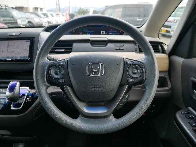 フリードハイブリッド ハイブリッド・Ｇホンダセンシング　ユーザー様買取車両　女性ワンオーナー車　両側パワースライドドア　７人乗り　ナビ・ＴＶ・バックカメラ　ＥＴＣ　プッシュスタート＆スマートキー２個　衝突被害軽減システム　オートクルーズ（3枚目）