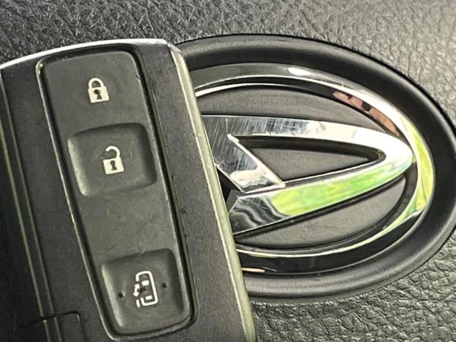 タント カスタムＸ　電動スライド　純正ＳＤナビ　バックカメラ　禁煙車　ドラレコ　スマートキー　ＨＩＤヘッド　オートエアコン　純正１４インチアルミ　ＣＤ　ドアバイザー　フォグライト　地デジ　電動格納ミラー（7枚目）