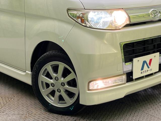 タント カスタムＸ　電動スライド　純正ＳＤナビ　バックカメラ　禁煙車　ドラレコ　スマートキー　ＨＩＤヘッド　オートエアコン　純正１４インチアルミ　ＣＤ　ドアバイザー　フォグライト　地デジ　電動格納ミラー（12枚目）